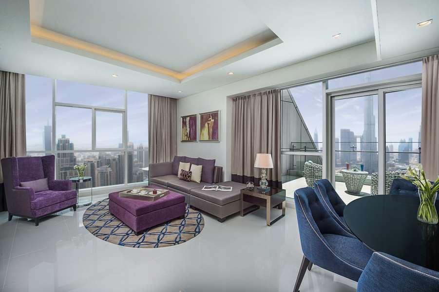Damac Maison Distinction Dubai Camera foto A living room in a typical apartment