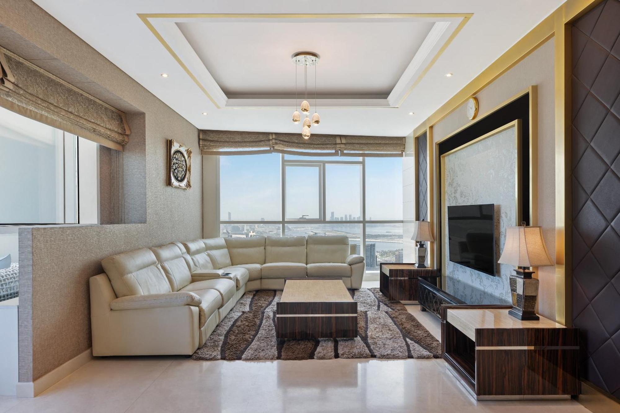 Damac Maison Distinction Dubai Esterno foto A living room in a typical apartment