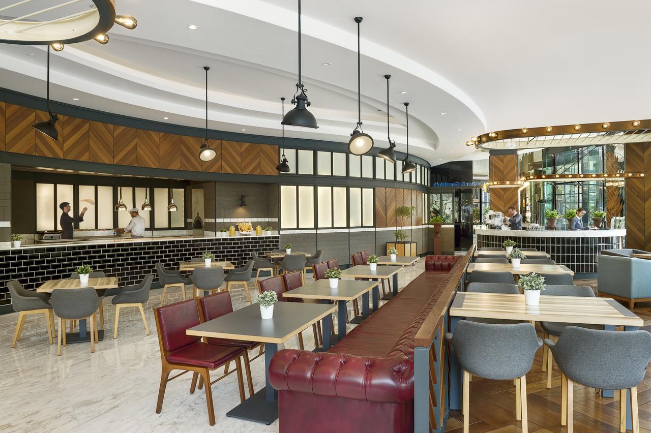 Damac Maison Distinction Dubai Esterno foto The interior of the restaurant